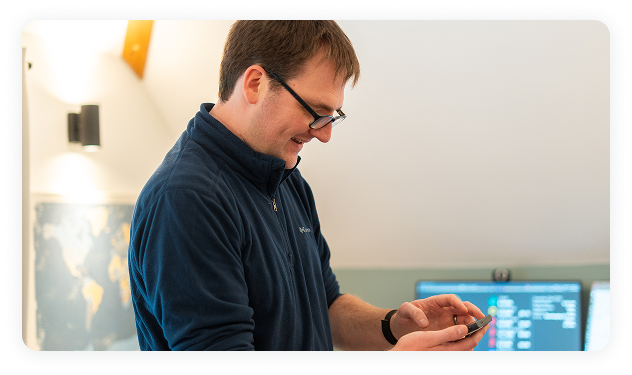 man looking at phone